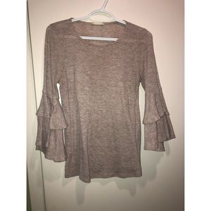 Tan/light pink shirt.